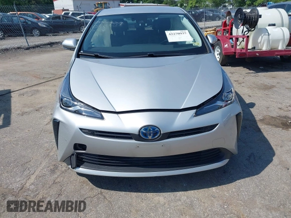 2021 Toyota Prius L Eco z VIN JTDKAMFU5M3137298, wystawiony jako IAAI lot #42270937 z przebiegiem 38 828 mil mil oraz . Historia ofert i sprzedaży dostępna na DreamBid. Obrazek 11.