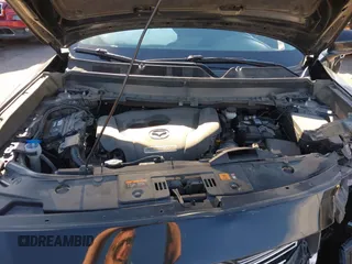 2018 Mazda CX-9 Sport with VIN JM3TCBBY6J0222750, listed as a IAAI auction lot 42294464 with 63,927 mi miles and . Bid and sale history available at DreamBid. Image 10.