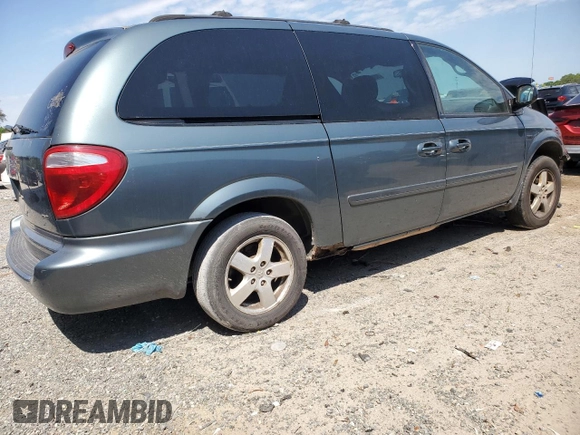 2007 Dodge Grand Caravan SXT with VIN 2D4GP44L27R357611, listed as a Copart auction lot 52884235 with 224,717 mi miles and Salvage Title. Bid and sale history available at DreamBid. Image 3.