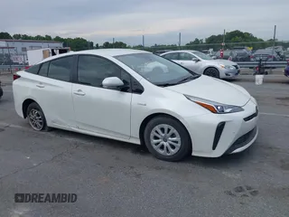 2019 Toyota Prius L Eco z VIN JTDKARFU3K3102222, wystawiony jako IAAI lot #42291403 z przebiegiem 27 669 mil mil oraz . Historia ofert i sprzedaży dostępna na DreamBid. Obrazek 1.