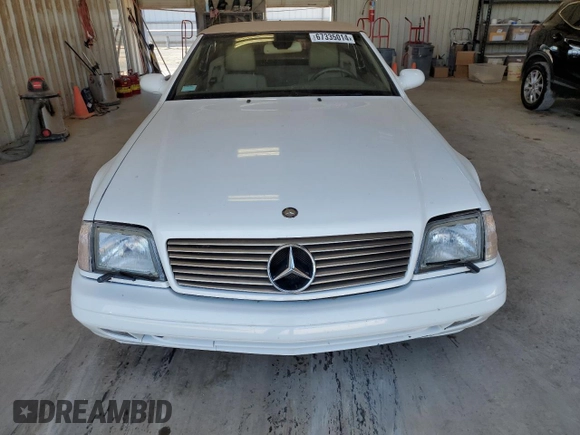 1999 Mercedes-Benz SL-Class with VIN WDBFA68F2XF179134, listed as a Copart auction lot 67335014 with 68,406 mi miles and Clean Title. Bid and sale history available at carsss.com. Image 5.