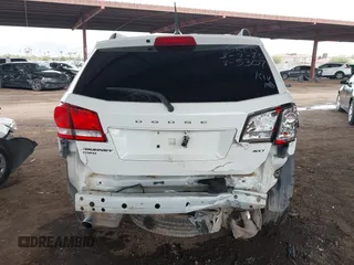 2017 Dodge Journey SXT z VIN 3C4PDDBG2HT595307, wystawiony jako IAAI lot #41813975 z przebiegiem 192 659 mil mil oraz . Historia ofert i sprzedaży dostępna na DreamBid. Obrazek 15.