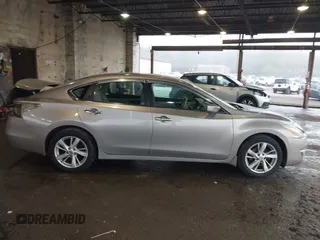 2013 Nissan Altima SV with VIN 1N4AL3AP7DC195534, listed as a IAAI auction lot 42493329 with 197,570 mi miles and . Bid and sale history available at DreamBid. Image 14.