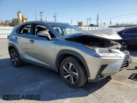 2021 Lexus NX 300 with VIN JTJGARBZ7M2191564, listed as a Copart auction lot 57974155 with 52,499 mi miles and Salvage title. Bid and sale history available at DreamBid. Image 4.