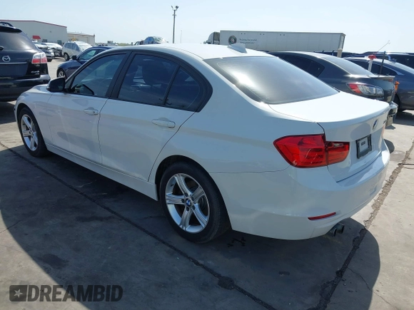 2014 BMW 3 Series 328i with VIN WBA3C1C52EK111076, listed as a IAAI auction lot 41817471 with 98,759 mi miles. Bid and sale history available at carsss.com. Image 3.