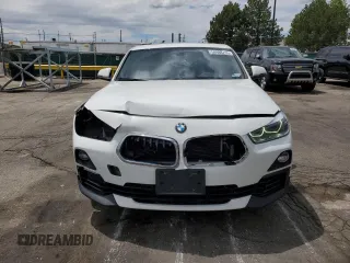 2018 BMW X2 xDrive28i z VIN WBXYJ5C38JEF79686, wystawiony jako Copart lot #56988735 z przebiegiem 103 799 mil mil oraz Szkoda całkowita • Salvage title. Historia ofert i sprzedaży dostępna na DreamBid. Obrazek 5.