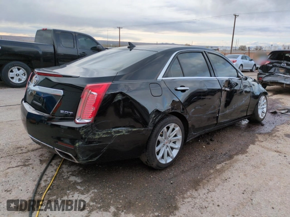 2014 Cadillac CTS RWD z VIN 1G6AP5SX6E0193868, wystawiony jako Copart lot #51795485 z przebiegiem 100 039 mil mil oraz Szkoda całkowita • Salvage title. Historia ofert i sprzedaży dostępna na DreamBid. Obrazek 3.