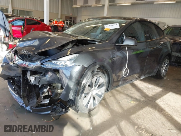 2021 Tesla Model Y Long Range with VIN 5YJYGDEE2MF087871, listed as a IAAI auction lot 41370004 with 85,757 mi miles. Bid and sale history available at carsss.com. Image 21.