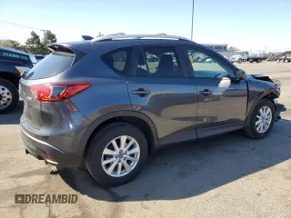 2014 Mazda CX-5 Touring with VIN JM3KE2CY7E0366690, listed as a Copart auction lot 50783635 with 127,853 mi miles and Salvage Title. Bid and sale history available at carsss.com. Image 3.
