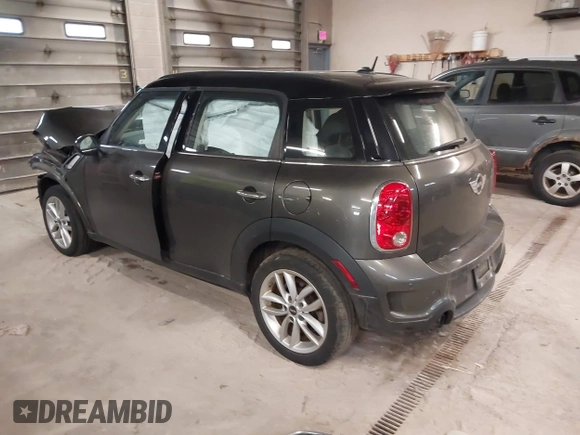 2012 MINI Countryman S with VIN WMWZC3C59CWL83491, listed as a IAAI auction lot 41791573 with 115,355 mi miles and . Bid and sale history available at DreamBid. Image 3.