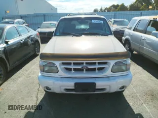 1999 Ford Explorer XLT with VIN 1FMZU34E8XZB27387, listed as a Copart auction lot 74398364 with 211,520 mi miles and Clean title. Bid and sale history available at DreamBid. Image 5.