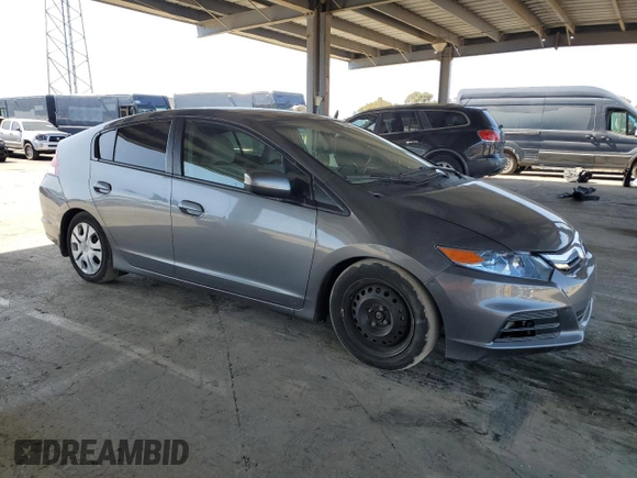 2013 Honda Insight with VIN JHMZE2H3XDS003838, listed as a Copart auction lot 52220235 with 144,729 mi miles and Salvage title. Bid and sale history available at DreamBid. Image 4.
