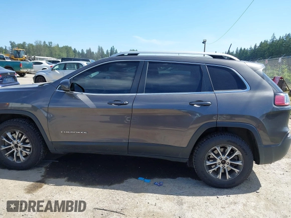 2019 Jeep Cherokee Latitude Plus z VIN 1C4PJMLNXKD195563, wystawiony jako IAAI lot #42461618 z przebiegiem 78 603 mil mil oraz . Historia ofert i sprzedaży dostępna na DreamBid. Obrazek 14.