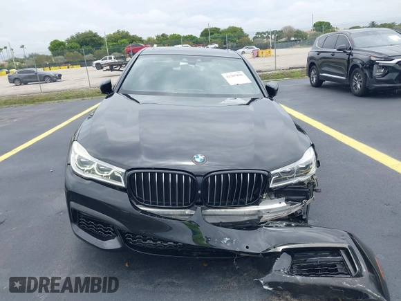 2018 BMW 7 Series 750i z VIN WBA7F0C54JGM23528, wystawiony jako IAAI lot #42205896 z przebiegiem 91 772 mil mil oraz . Historia ofert i sprzedaży dostępna na DreamBid. Obrazek 12.