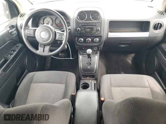 2017 Jeep Compass Sport with VIN 1C4NJCBA4HD147548, listed as a Copart auction lot 55671495 with 108,592 mi miles and Salvage title. Bid and sale history available at DreamBid. Image 8.