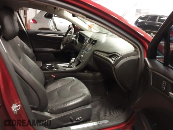 2014 Ford Fusion Titanium with VIN 3FA6P0K97ER324027, listed as a IAAI auction lot 41327141 with 161,045 mi miles and . Bid and sale history available at DreamBid. Image 5.