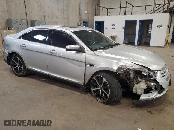 2015 Ford Taurus SEL z VIN 1FAHP2E85FG177576, wystawiony jako Copart lot #54739595 z przebiegiem 89 156 mil mil oraz Szkoda całkowita • Salvage title. Historia ofert i sprzedaży dostępna na DreamBid. Obrazek 4.