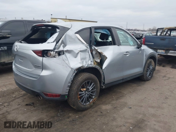 2021 Mazda CX-5 Touring with VIN JM3KFBCM7M0356685, listed as a IAAI auction lot 41136689 with 45,224 mi miles. Bid and sale history available at carsss.com. Image 4.