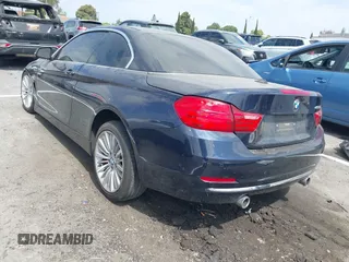 2015 BMW 4 Series 435i z VIN WBA3T3C51FP738285, wystawiony jako IAAI lot #42544807 z przebiegiem 56 274 mil mil oraz . Historia ofert i sprzedaży dostępna na DreamBid. Obrazek 3.