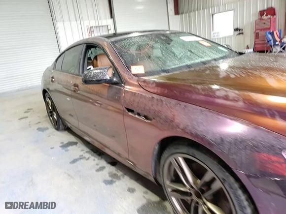 2016 BMW 6 Series 650i xDrive with VIN WBA6D6C55GGF94711, listed as a Copart auction lot 52917475 with 103,965 mi miles and Non Repairable. Bid and sale history available at carsss.com. Image 13.