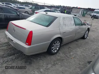 2008 Cadillac DTS 1SC with VIN 1G6KD57Y08U112942, listed as a IAAI auction lot 41836523 with 157,932 mi miles and . Bid and sale history available at carsss.com. Image 4.