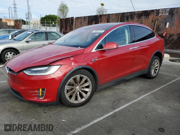 2016 Tesla Model X 70D with VIN 5YJXCAE28GF002399, listed as a Copart auction lot 50884225 with 73,113 mi miles and Salvage Title. Bid and sale history available at DreamBid. Image 1.