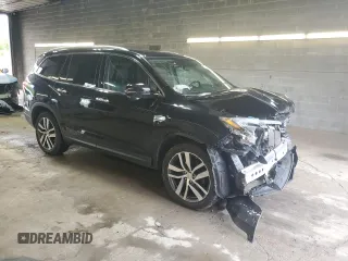 2017 Honda Pilot Touring z VIN 5FNYF6H91HB011030, wystawiony jako Copart lot #60236875 z przebiegiem 119 909 mil mil oraz Szkoda całkowita • Salvage title. Historia ofert i sprzedaży dostępna na DreamBid. Obrazek 4.