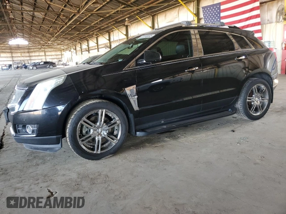 2012 Cadillac SRX Premium Collection z VIN 3GYFNFE30CS599863, wystawiony jako Copart lot #61249995 z przebiegiem 144 740 mil mil oraz Czysty tytuł • Clean title. Historia ofert i sprzedaży dostępna na DreamBid. Obrazek 1.