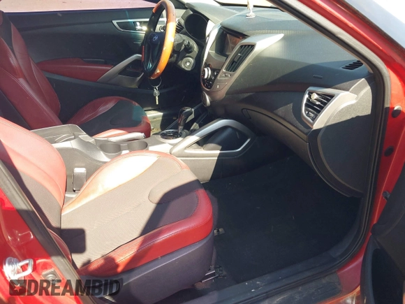 2012 Hyundai Veloster w/Black Int with VIN KMHTC6AD3CU032989, listed as a IAAI auction lot 42633748 with 137,727 mi miles and . Bid and sale history available at DreamBid. Image 5.