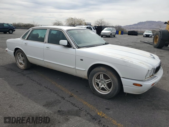 1999 Jaguar XJ with VIN SAJHX1048XC861105, listed as a Copart auction lot 50108225 with Not provided miles and Clean title. Bid and sale history available at DreamBid. Image 4.