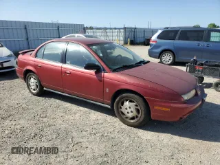 1996 Saturn SL with VIN 1G8ZK5278TZ334649, listed as a Copart auction lot 54098725 with 156,012 mi miles and Salvage Title. Bid and sale history available at carsss.com. Image 4.