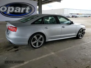2014 Audi A6 Prestige z VIN WAUHGAFC1EN143102, wystawiony jako Copart lot #53692145 z przebiegiem 101 503 mil mil oraz Szkoda całkowita • Salvage title. Historia ofert i sprzedaży dostępna na DreamBid. Obrazek 3.