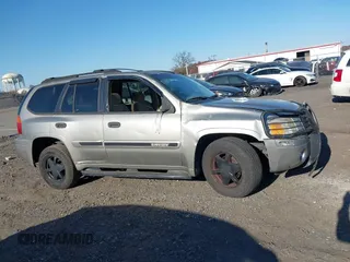 2002 GMC Envoy SLT with VIN 1GKDT13S822304832, listed as a IAAI auction lot 40874054 with 132,883 mi miles. Bid and sale history available at carsss.com. Image 13.