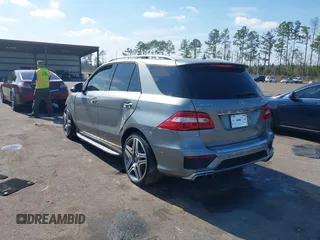 2013 Mercedes-Benz M ML 63 AMG with VIN 4JGDA7EB9DA155725, listed as a IAAI auction lot 41502675 with 64,849 mi miles. Bid and sale history available at carsss.com. Image 3.