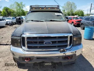 2004 Ford F-250 XL z VIN 1FTNX21P94EC33909, wystawiony jako Copart lot #55983665 z przebiegiem 243 869 mil mil oraz Czysty tytuł • Clean title. Historia ofert i sprzedaży dostępna na DreamBid. Obrazek 5.