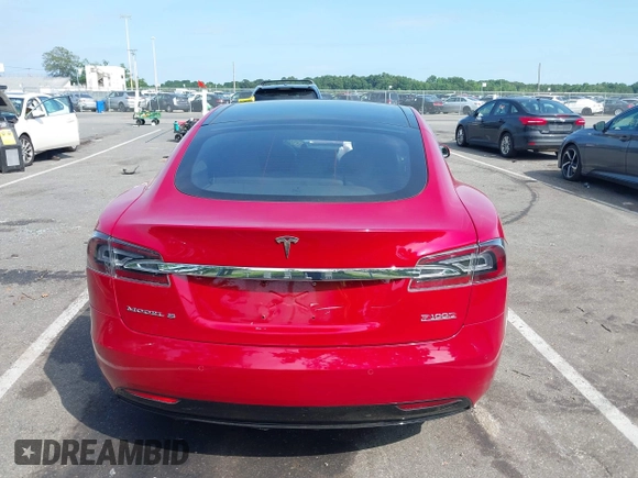 2016 Tesla Model S 90D z VIN 5YJSA1E4XGF171244, wystawiony jako IAAI lot #42584589 z przebiegiem 85 412 mil mil oraz . Historia ofert i sprzedaży dostępna na DreamBid. Obrazek 16.