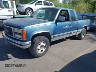 1992 GMC Sierra 1500 z VIN 2GTEK19K1N1520018, wystawiony jako IAAI lot #42116679 z przebiegiem 239 658 mil mil oraz . Historia ofert i sprzedaży dostępna na DreamBid. Obrazek 2.
