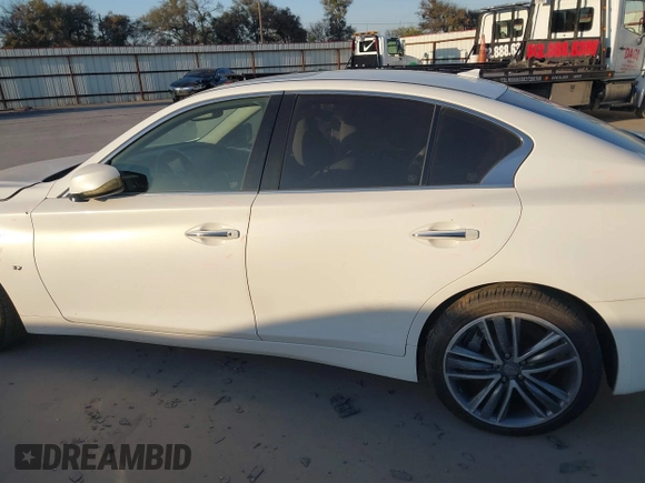 2015 Infiniti Q50 Premium with VIN JN1BV7AP1FM336842, listed as a IAAI auction lot 40893482 with 96,634 mi miles. Bid and sale history available at carsss.com. Image 14.