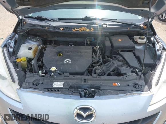 2012 Mazda 5 Sport with VIN JM1CW2BLXC0106748, listed as a IAAI auction lot 42435965 with 153,786 mi miles and . Bid and sale history available at DreamBid. Image 10.