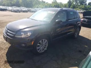 2014 Volkswagen Tiguan SEL с VIN WVGBV3AXXEW511786, выставлен на аукционе Copart как лот 61853285 с пробегом 244 479 миль миль и Чистый • Clean title. История ставок и продаж доступна на DreamBid. Изображение 1.