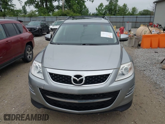 2012 Mazda CX-9 Grand Touring z VIN JM3TB3DA0C0337713, wystawiony jako IAAI lot #42368488 z przebiegiem 184 220 mil mil oraz . Historia ofert i sprzedaży dostępna na DreamBid. Obrazek 12.