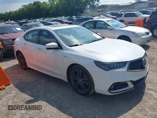 2019 Acura TLX w/A-Spec Pkg with VIN 19UUB1F60KA005260, listed as a IAAI auction lot 42643481 with 119,396 mi miles and . Bid and sale history available at DreamBid. Image 1.