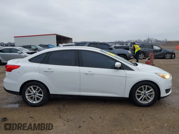2016 Ford Focus SE with VIN 1FADP3F25GL312269, listed as a IAAI auction lot 41586489 with 76,216 mi miles. Bid and sale history available at carsss.com. Image 13.