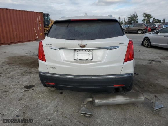 2018 Cadillac XT5 Luxury FWD with VIN 1GYKNCRS8JZ182473, listed as a Copart auction lot 88485265 with 76,595 mi miles and Salvage Title. Bid and sale history available at carsss.com. Image 6.