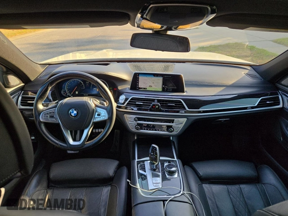 2017 BMW 7 Series 740i with VIN WBA7E2C54HG740427, listed as a Copart auction lot 54992345 with 93,252 mi miles and Clean Title. Bid and sale history available at carsss.com. Image 9.