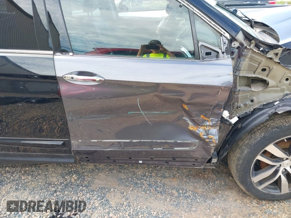 2017 Honda Pilot Touring with VIN 5FNYF5H91HB038268, listed as a IAAI auction lot 42786448 with 62,195 mi miles and . Bid and sale history available at DreamBid. Image 19.