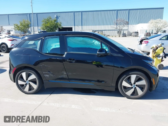 2017 BMW i3 z VIN WBY1Z8C54HV889592, wystawiony jako IAAI lot #41820029 z przebiegiem 50 530 mil mil oraz . Historia ofert i sprzedaży dostępna na DreamBid. Obrazek 13.