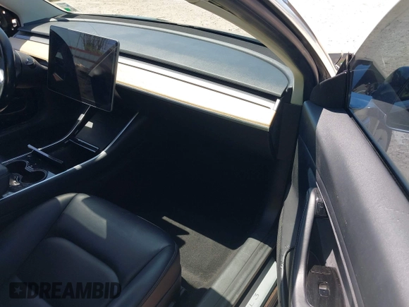 2018 Tesla Model 3 Long Range Battery with VIN 5YJ3E1EAXJF019907, listed as a IAAI auction lot 41995969 with Not Provided miles and . Bid and sale history available at DreamBid. Image 5.