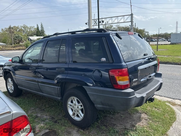 2004 Jeep Grand Cherokee Laredo with VIN 1J4GX48N24C436753, listed as a Copart auction lot 48782585 with 114,035 mi miles and Clean Title. Bid and sale history available at carsss.com. Image 3.