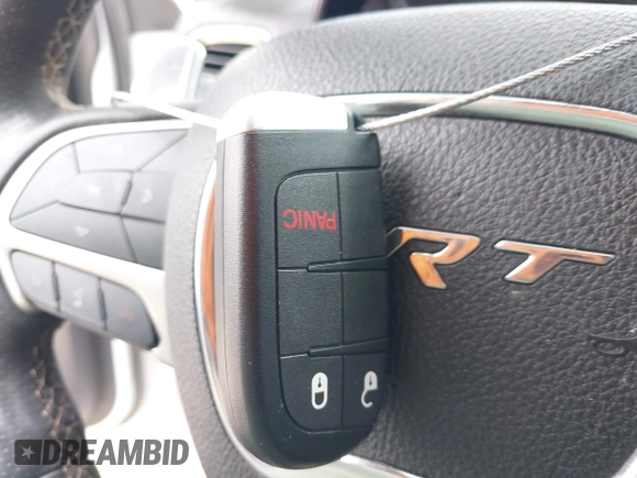 2018 Dodge Durango SRT with VIN 1C4SDJGJXJC395094, listed as a IAAI auction lot 41857351 with 90,106 mi miles and . Bid and sale history available at DreamBid. Image 11.